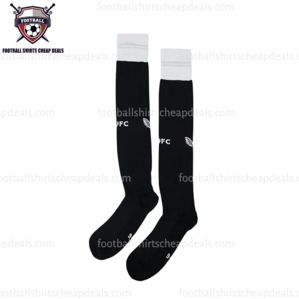 the socks in Newcastle Home Kid Football Kit 2023/24